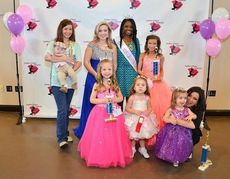 Winners listed are from oldest to youngest: Miss Southern Dance Connection Hayley Smith, Junior Miss Mary Alice Boone, Little Miss Ellie Mason, Petite Miss Giuliana Montemayor, Tiny Miss Adalyn Lovelace, Master SDC Noah Ellis. Miss Greater Greer Teen Brittany Doss is third from the left.