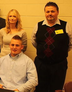 Cole Henderson signed with Lenoir-Rhyne University as his parents, Kelee and Joe Henderson, attended the ceremony.
 