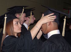 Greer High grads prepare for their final exercise – receiving their diplomas.
 
