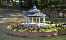 The wrap around porch gives a picturesque view of City Park's gazebo. It has become a signature landmark that attracts special events.