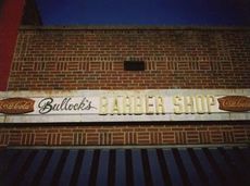 This is the sign that hung for more than 40 years over Bullock's Barber Shop before thieves removed it in February.
 
 
 
 