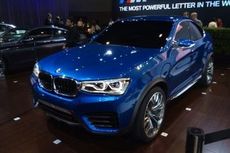 This photo of the all-new X4 was captured at the Los Angeles Auto Show. It's the first time the BMW's newest member of the X family was shown outside of its concept introduced at the Shanghai Auto Show earlier this year.