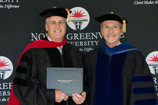 Mayor Rick Danner was presented an honorary Doctor of Christian Leadership by interim North Greenville University president Dr. Randall J. Pannell.
 
