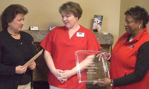 Becky Pickett, owner of Home Helpers and Direc Link, Cindy Anthony, and Ann Ledbetter, Client Caregiver Manager, celebrate Anthony's selection as the company's 2012 Caregiver for the Year.