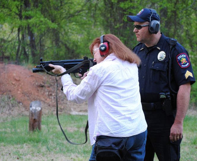 Citizens Academy participants are taken to the firing range to experience the same techniques police officers learn.