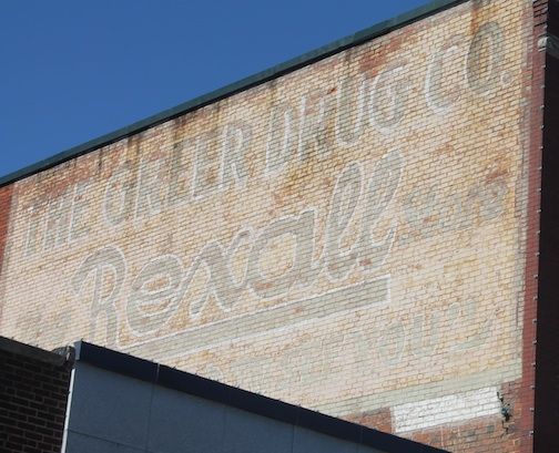 The Greer Drug Co. and Rexall sign will be given a facelift with its original color scheme. The building is located at 200 Trade Street.
