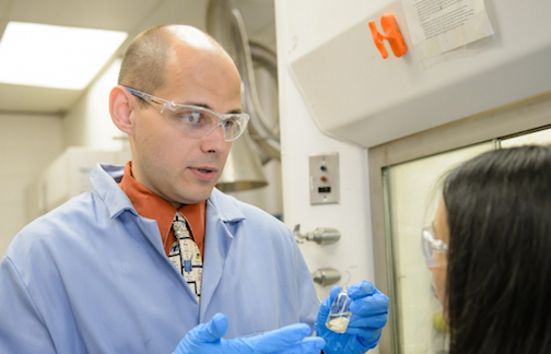 Andy Tennyson, an assistant professor of inorganic chemistry, works with a member of his team in Hunter Chemistry Laboratory at Clemson.
 
 