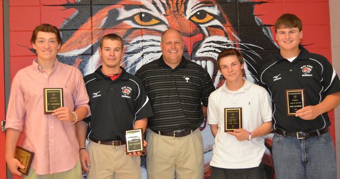 Baseball head coach Travis Henson, middle, presented the awards to the Blue Ridge Tigers at their team banquet last Thursday. Honored, left to right, were Ty Montgomery, Alex Williams, Zach Byer and Robert Westenrieder.