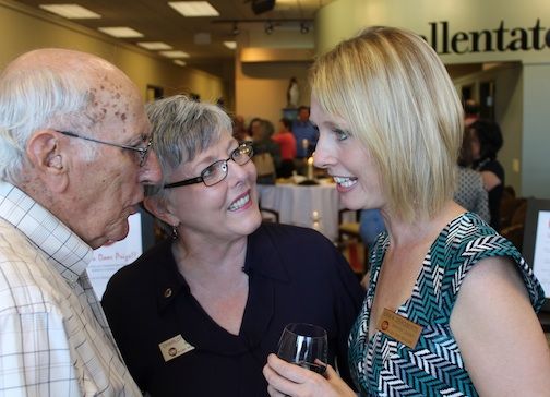 Charlotte Rigby, center, a Branch Leader at Allen Tate Realtors, introduces her father, D.B. McCauley to Greer Office Leader Erika DeRoberts at Tuesday's ribbon cutting.