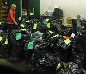 Bags are packed and labeled for families. Greer Relief's system has enabled it to serve 700 familes in two days while allowing for individual shopping on the final two days of the four-day event.