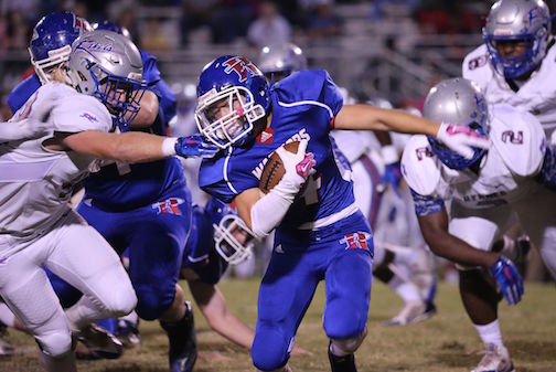 Riverside's Robert Wang tries to find some running room against Byrnes Friday night.
 