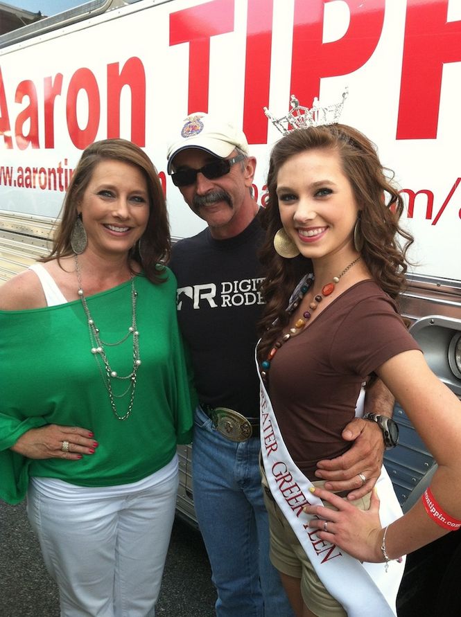 Gina and Sydney Sill posed with Aaron Tippin before his performance during Saturday's Family Fest. Sydney, Miss Greater Greer Teen, was at the Family Fest Friday and Saturday emceeing the Miss Princess contest with Miss Greer Lauren Cabaniss. The Miss South Carolina Pagean is less than two months away.