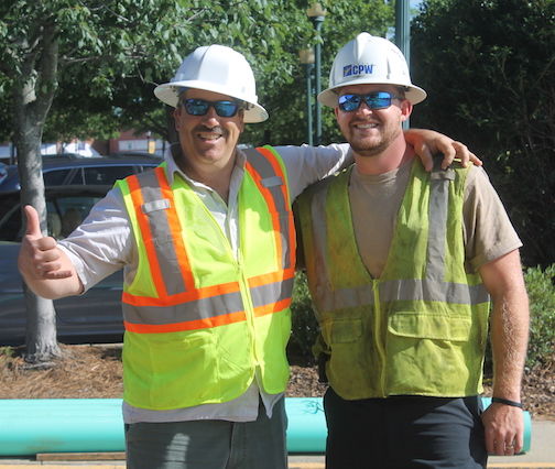Peppy Cusano, Dillard Excavating project manager on the left, and Jonathan Jordan, CPW sewer crew leader, share a jovial moment.
 
 
 