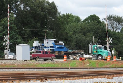 The first of three rubber-tiered gantry (RTG) components arrived by truck Monday at the South Carolina Inland Port in Greer.