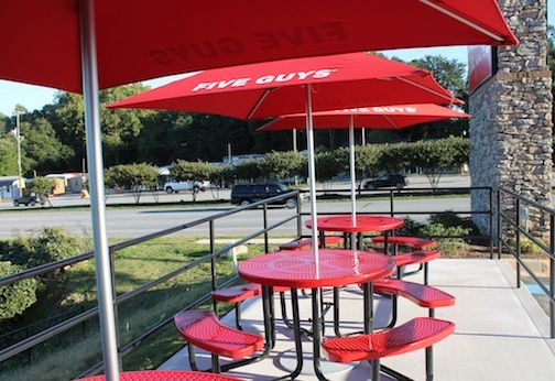 An outdoor patio is offered at the Greer location.
 