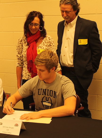 Tyler Wright signed with Union College in Kentucky. Read story here,
 