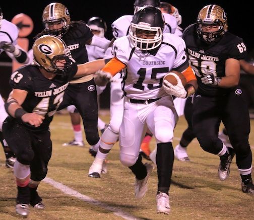 Tyler Wright (43) zeros in on Southside's Luttrell Dallas (15).  Dallas gained 143 yards on 19 carries for Southside.