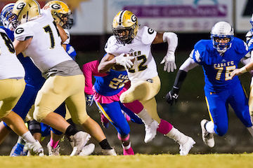 Dre Williams of Greer is off and running for some of his game-leading 170 yards rushing.
 