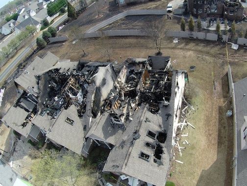 A three-unit condominium was destroyed when the grass fired jump to the neighborhood.
