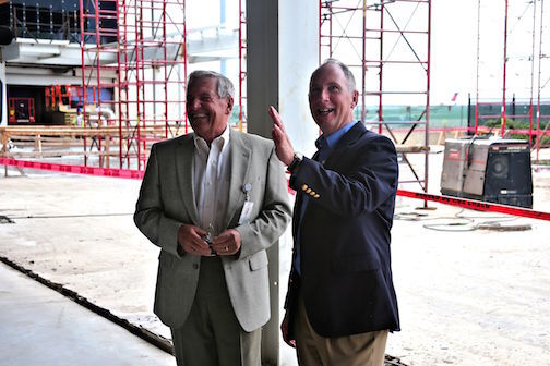 Hank Ramella, GSP commissioner, and Dave Edwards, right, Executive Director of the GSP Airport District, observe the construction ongoing as part of the airport's $122 million terminal improvement plan.
