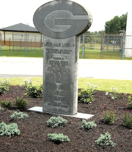 The marker outside the entrance to Dooley Field was given a cleaning and the area around it landscaped.