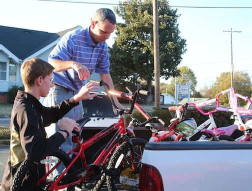 A pickup truck full of bikes are off to storage until the toys are distributed next month.
 