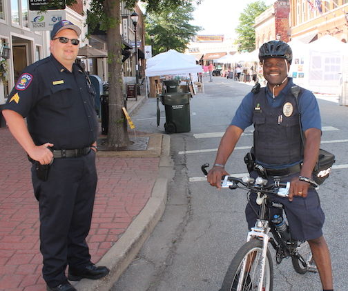 Greer police were securing the festival streets and monitoring vehicles dropping off their goods.
 