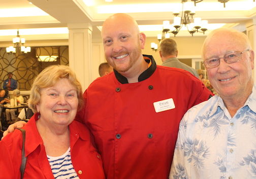 John Mason, center, Director of Dining Services Manager, invited his parents, Wendy and Jack, to visit during the ribbon cutting and observe his food preparation and plating for the residents.
 
 