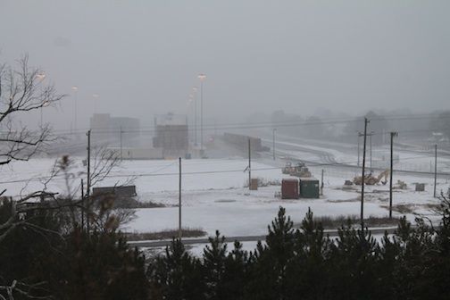 The Greer Inland Port was hardly visible through the blowing snow.