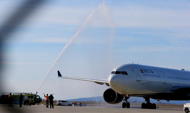 The GSP fire department greeted the Tigers' flight with a water canon salute.
