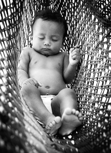 Williams titled this photo of an infant in a hammock 