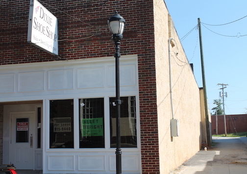 The Board of Architectural Review approved windows on the alley side of the former Dixie Shoe Shop, outdoor lighting and the panels below the front brick during Tuesday's meeting at City Hall. The paint color is still to be determined but the brick will not be painted or disturbed.
 
 
 