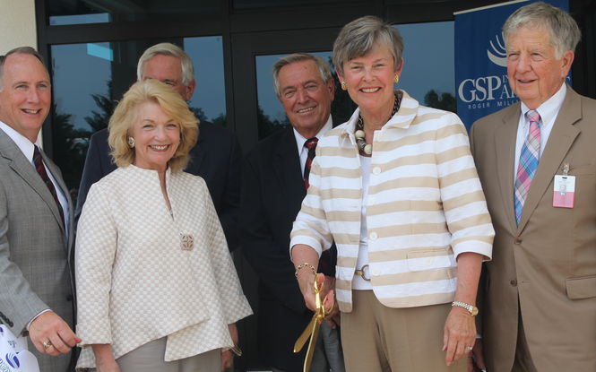 Dave Edwards, President/CEO of the GSP Airport District, joined the board of commissioners at the ribbon cutting of a $2.7 million facilities project. Joining Edwards, left to right, are Valerie Miller, Bill Barnet, Hank Ramella, Minor Shaw and Leland Burch.
 