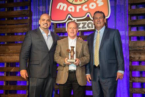 Mike Hunter of Greer, co-franchisee of seven Marco's Pizza restaurants, is flanked by Vice President of Operations Tony Libardi, on the left, and President/COO Bryon Stephens.
 
 