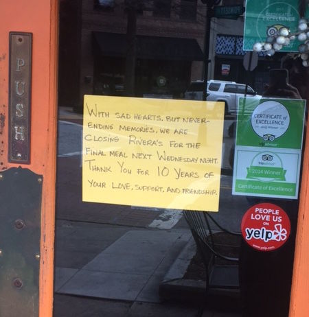 The sign on the door at Rivera's greeted customers.
 