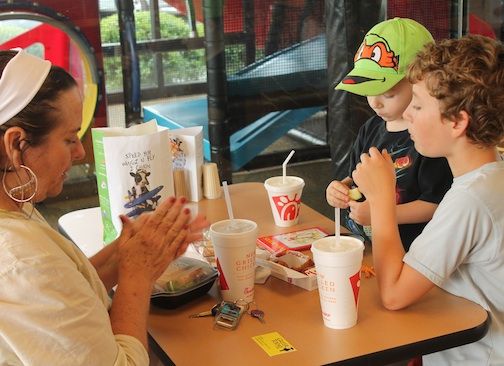 Jody Levin visited Chick-fil-A on Wade Hampton Blvd. on its re-opening Monday after undergoing a complete renovation in June. Levin's grandchildren, Cyrus Jones and Donovan Estenfeld, appeared to reap the rewards of this trip.
 