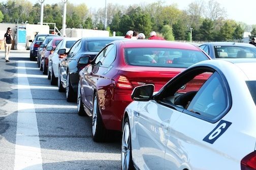 Vehicles lined up at the BMW Performance Center took guests for a spin.