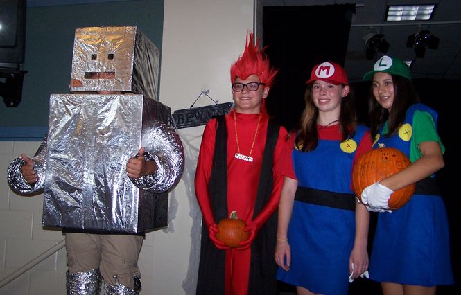 More than 550 students attended the annual Riverside Middle School Halloween Dance.  Winners of the Costume Contest were, left to right:  1st Place – Isaiah Harris, 3rd Place – Alex Cook, and 2nd Place - Carington Cantarella & Sophia Della Rocca.