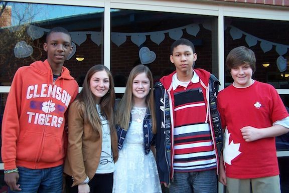 Students left to right:  Braxton Collins, Alex Smith, Marianne Garcia-Alonso, DeAnte Bruton, and Jimmy Fritzsche pose at the Valentine's Dance.