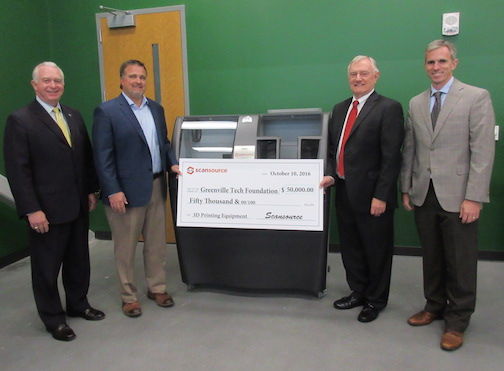 Left to right: Keith Miller, president of Greenville Technical College, Paul Constantine, Co-President for the ScanSource Worldwide Barcode, Networking and Security segment, Les Gardner, director of development with the Greenville Tech Foundation, and David Clayton, executive director of the Center for Manufacturing Innovation, gather with donated equipment at the Center for Manufacturing Innovation.
 