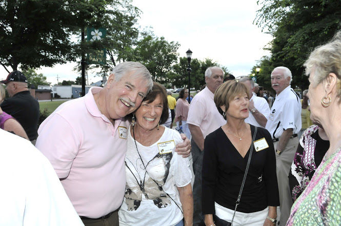 Smiles and hugs was the universal language at last year's reunion.