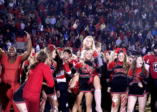 Blue Ridge cheerleaders and students celebrate their win over Greer Friday night to earn a share of the Region II-AAA championship.