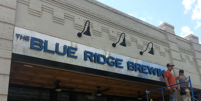 The Blue Ridge Brewing Co. signage, with its traditional blue lettering on a silver background, was attached to its restaurant at 308 Trade Street.
 