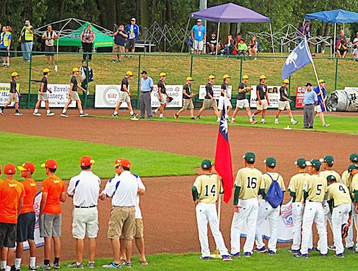 Northwood marches onto Heritage Park Field at Taylor, Mich., for the opening ceremonies for the Junior League World Series.
 