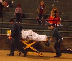 A player from the Upstate Jackets is being taken from the field by paramedics. He complained of neck pain after being injured midway in the third quarter of the 12-under game at Greer City Park.