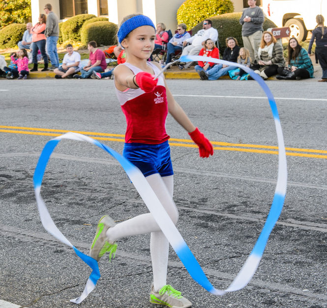 A rhythmic dancer parades along Poinsett in the 2015 Christmas Parade.
 